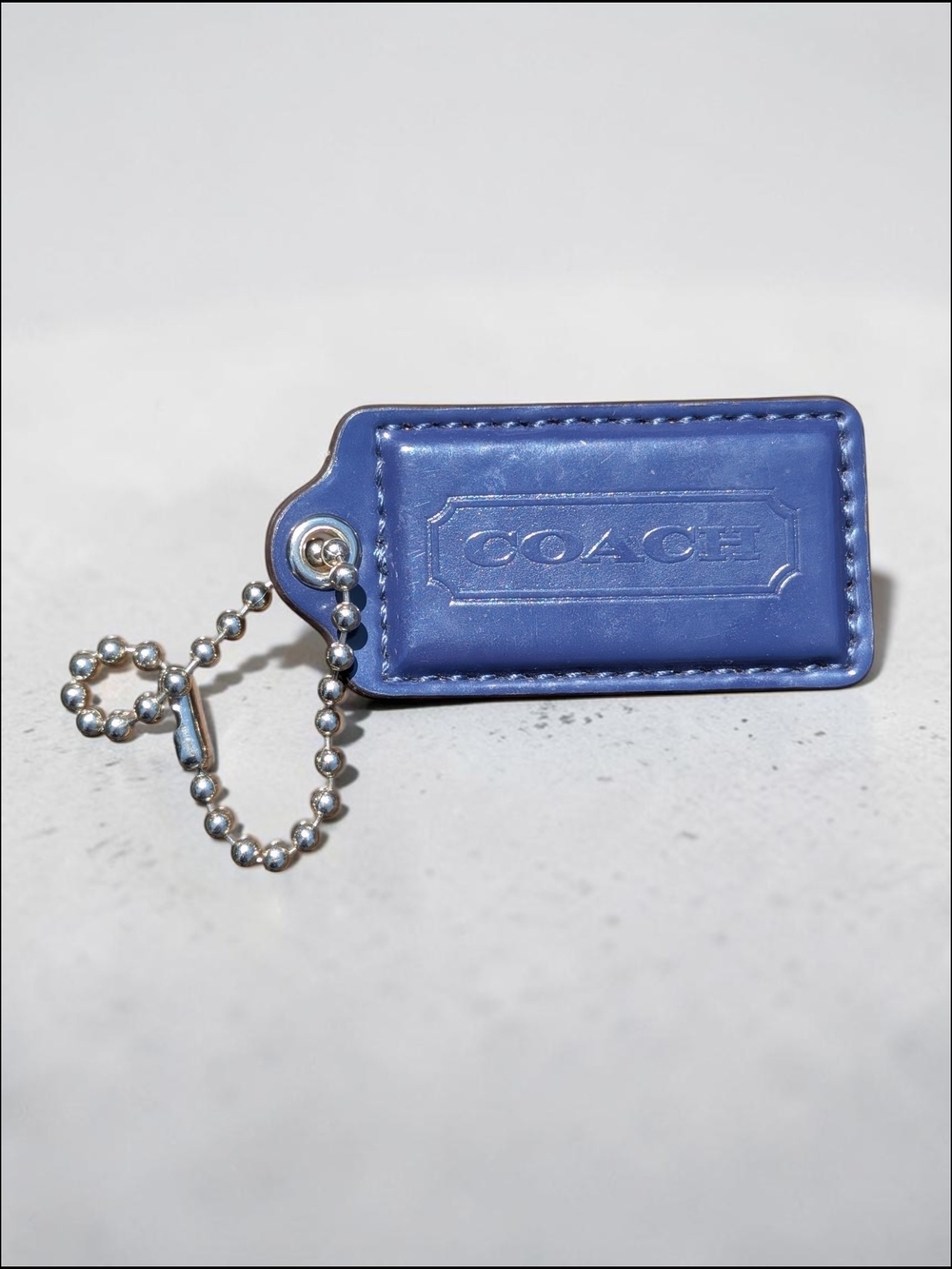 Coach 2.25" Blue Patent Leather Hangtag